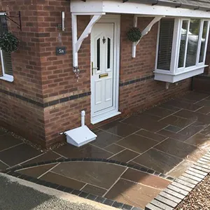 a brick house with a white front door